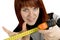 Redhead girl with measuring tool ruler