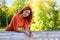 Redhead girl at the railing