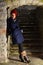 Redhead girl on stone stairways