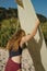 Redhead girl with surfboard