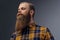 Redhead male dressed in a yellow hipster shirt.