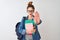 Redhead student woman wearing backpack holding books over  white background with open hand doing stop sign with serious