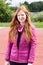 Redhead teenage girl in pink