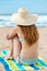 Redhead Woman In Bikini And Sunhat At Beach
