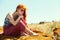 Redhead woman outdoors. stylish romantic young girl