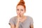 Redhead woman showing hush silence hand gesture with hand