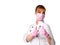 Redheaded woman, nurse or doctor, in medical suit, pink mask and disposable gloves. Showing thumbs up, posing isolated on white