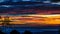 Redish and dark clouded sunset over the gulf of Nicoya