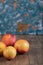 Redish peaches isolated on a wooden background