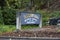 Redmond, WA USA - circa August 2021: Angled view of the Redmond Bicycle Capital of the Northwest sign near Lake Sammamish