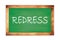 REDRESS text written on green school board