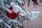 Reds balls on a snowy christmas tree