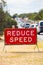 Reduce speed traffic sign street warning