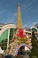 Reduced copy of Eiffel Tower in front of shops in Almaty