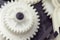 Reducer gears of white plastic closeup