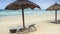 Reed Beach Umbrellas Chaise-longues on Sea Beach