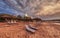 Reed parasols on empty beach