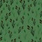 Reeds on a green  background. Seamless pattern.