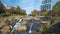 Reedy River Waterfalls in downtown of Greenville city in South Carolina. Falls Park Riverwalk at Liberty bridge