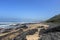 Reefs on a sand beach, african nature in the eastern cape, south africa, wild coast, lubungula