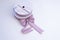 Reel with textile pink decorative ribbon bow