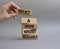 Refclect a grow mindset regularly symbol. Wooden blocks with words Refclect a grow mindset regularly. Businessman hand. Beautiful