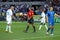 The referee Horacio Elizondo hands the ball to Zinedine Zidane to shoot the penalty