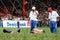 Referees inspect a pair of wrestlers at the Kirkpinar Turkish Oil Wrestling Festival in Edirne in Turkey.