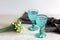 Refhesing drink in blue vintage goblets on the white background with srping flowers
