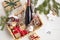 Refined Christmas gift basket for culinary enthusiats with bottle of wine and mulled wine ingredients