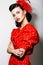 Refinement. Sophisticated Arrogant Woman in Red Polka Dot Dress with Crossed Arms. Fashion. Retro Style - Pin Up