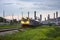 Refinery oil and petroleum industry factory zone and containers train  open light movement foreground with background sky in the