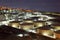 Refinery storage tanks at night