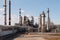 refinery with various processing units and equipment for extraction, refining, and storage of oil