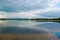 Reflecting lake in rural Lithuania