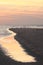 Reflecting sunset at Ameland beach, the Netherlands