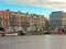 Reflection of Amsterdam famous duch traditional Flemish brick buildings, city canal in Holland, Netherlands