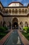 Reflection of the arches in the courtyard of the Alcazar in Sev