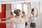 Reflection Of Ballerinas Performing