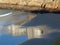 Reflection on the beach