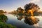 Reflection of a beautiful dawn sky in a river