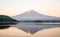 The reflection of beautiful Fuji mountain with bridge in lake  in the summer, the famous landmark and attraction place of tourists