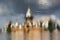 Reflection of beautiful old castle in water, inverted photo