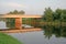 Reflection bridge on a river.