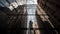 the reflection of buildings in the glass windows of a building in new york city, ny, on a sunny day with a blue sky in the