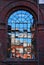 Reflection of buildings in old factory window in Lodz