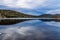 Reflection on the calm side of the pond. Barachois Pond Provincial Park Newfoundland Canada