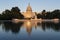 Reflection of Capitol building in pool in light of setting sun, Washington DC