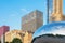 Reflection of city buildings on a metal surface of Cloud Gate also known as the Bean, Millennium Park