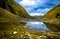 Reflection of clouds and sky serene desert valley in the hills of Himalaya